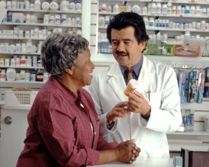 elderly woman is prescrbed bisphosphonate medication by a doctor