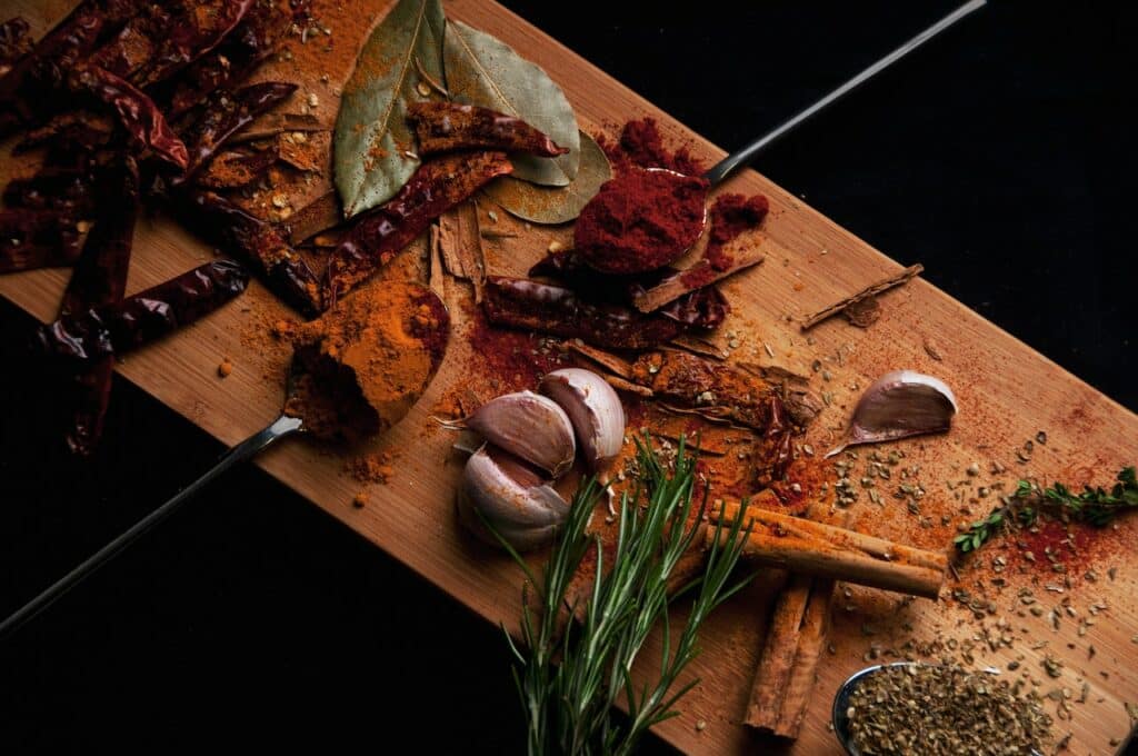 vegetables and spices used for sodium substitutes on cutting board