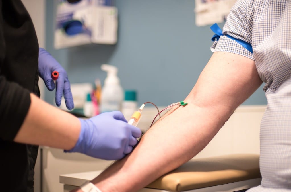patient getting blood drawn tests for anemia with CKD treatment