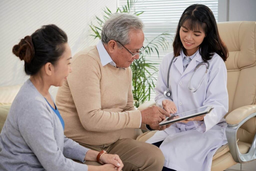 Nephrologist working with a patient
