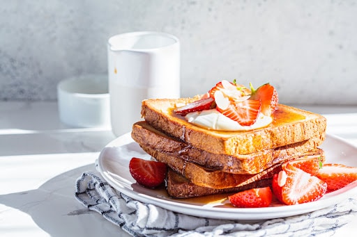 Stack of French toast with strawberries